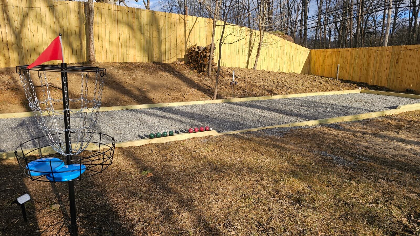 Spacious fenced backyard with seating