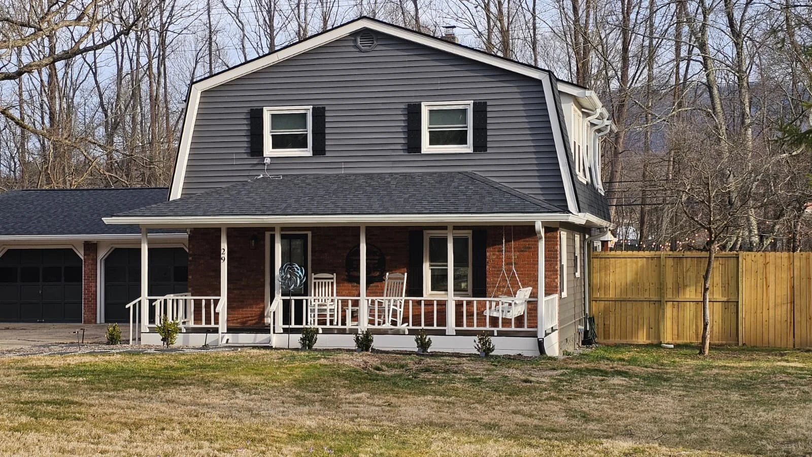 The front exterior of Mojo Manor in its residential Waynesville setting